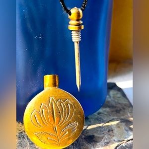 Vintage handcrafted dagger necklace holds perfume, sacred material, poison (?).